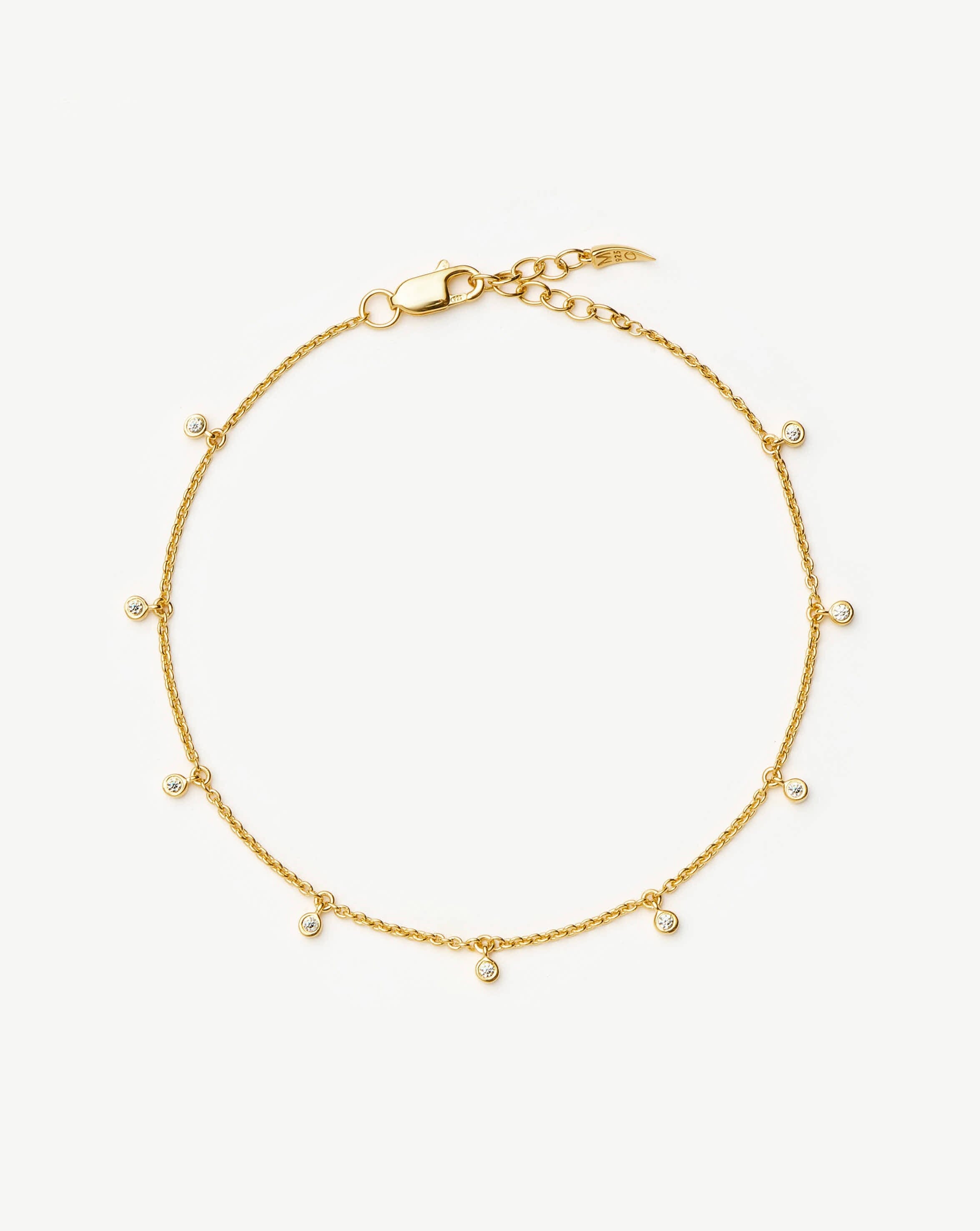 Gold Interstellar Drop Bracelet with White Cubic Zirconia | Cosmic Collection