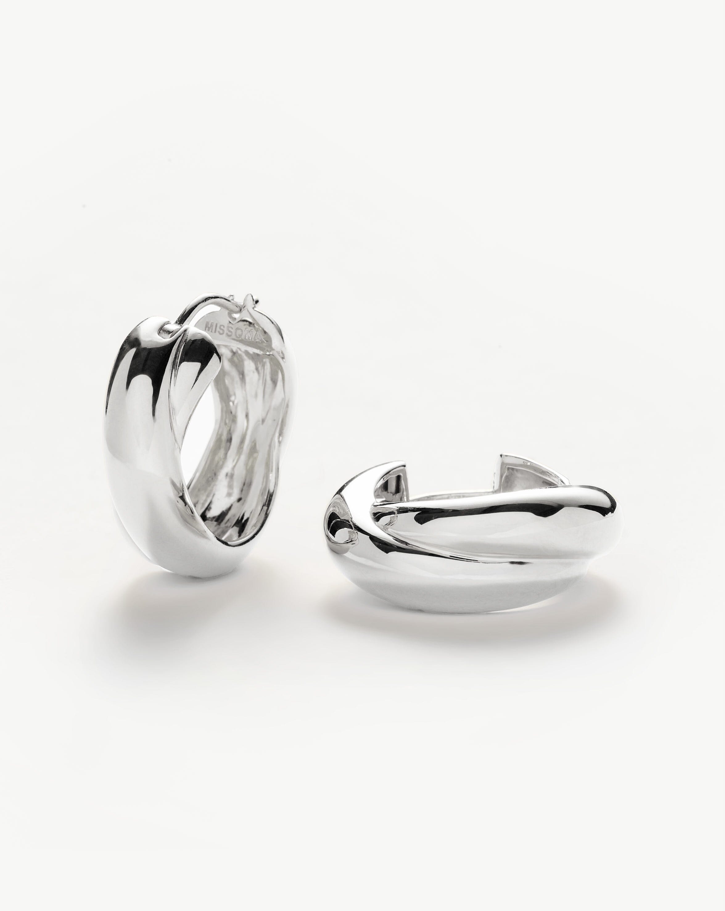 Chunky Silver Hoop Earrings with Crossover Design | Lucy Williams