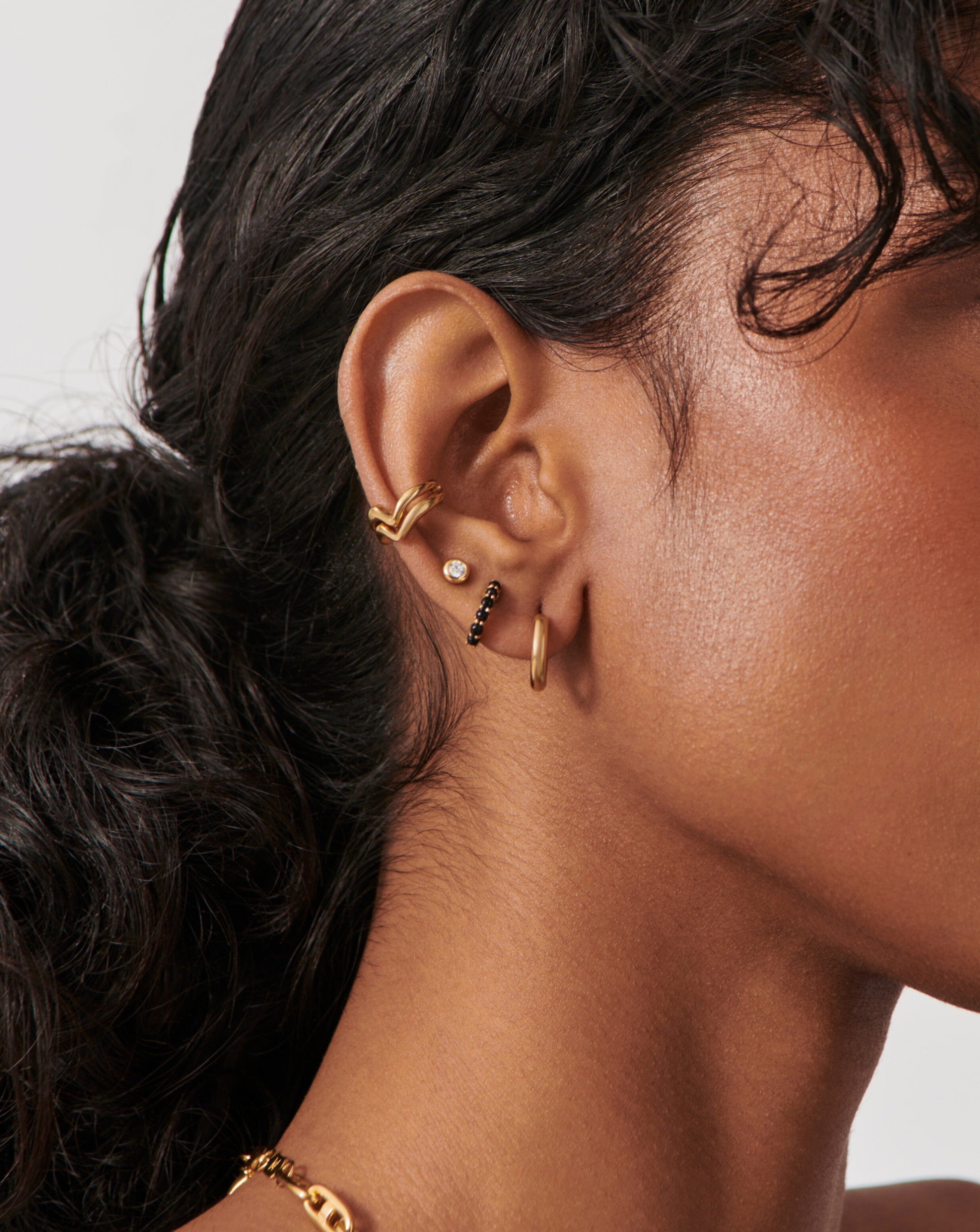 Black Onyx Huggie Earrings in 18k Gold Vermeil | Recycled Metals Collection