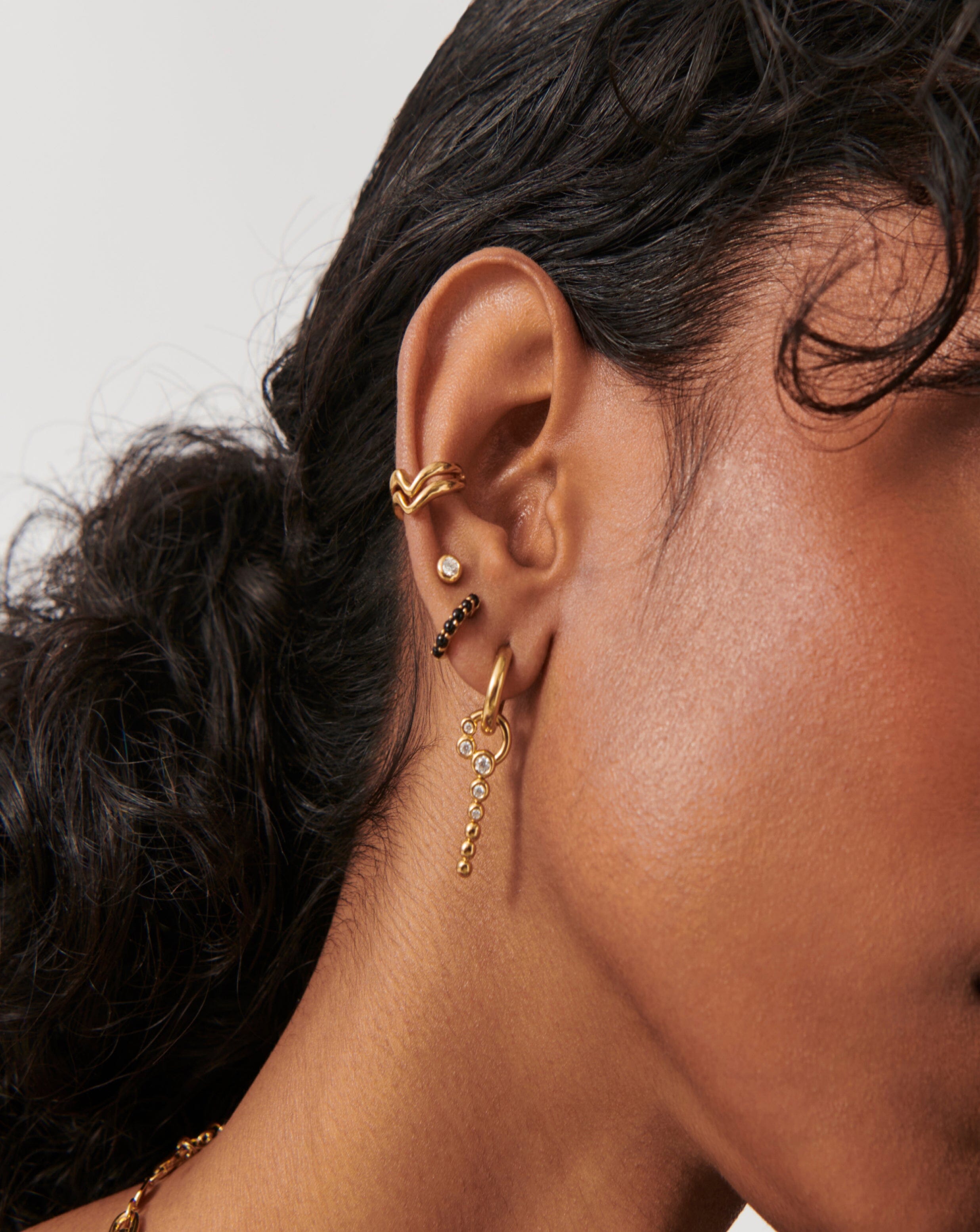Black Onyx Huggie Earrings in 18k Gold Vermeil | Recycled Metals Collection